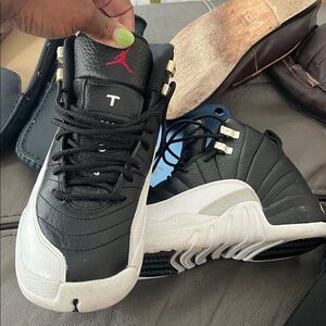 Black and White Sneakers with Red Logo